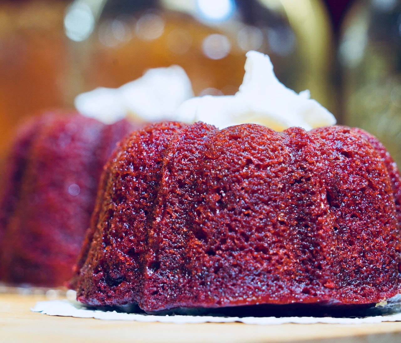 red velvet bundt cake with vanilla cream cheese frosting